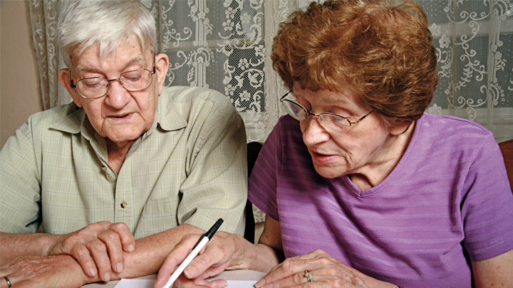 Couple reading documents